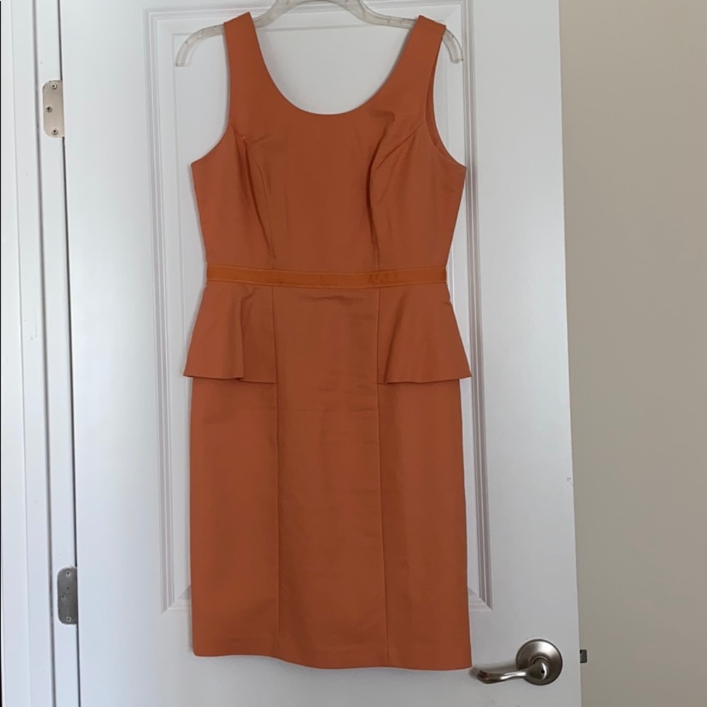 Orange sherbet dress with peplum